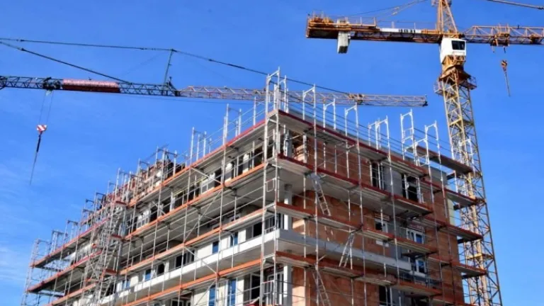 Cranes and Construction on an apartment building