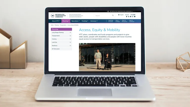 A laptop computer displaying the new MTC website.