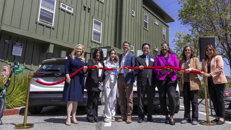 Event attendees from MTC, CARB and TransForm launch a new Mobility Hub at the Betty Ann Gardens apartments in San Jose.