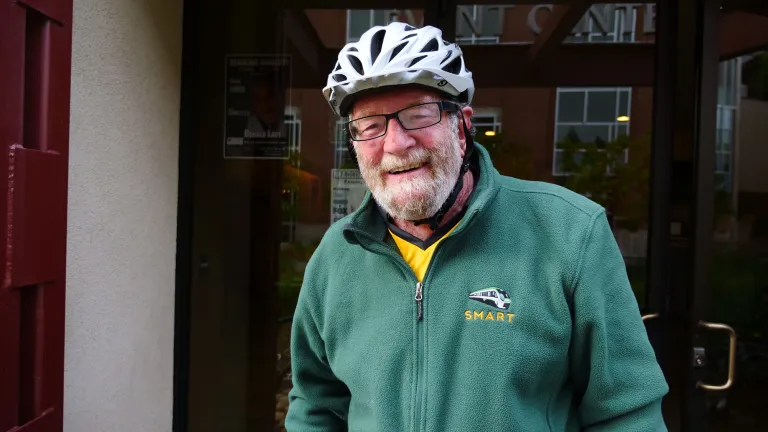 MTC Chair and Rohnert Park Mayor Jake Mackenzie gets an early start on Bike to Work Day with a ride from his home to an Energizer Station near Sonoma State University
