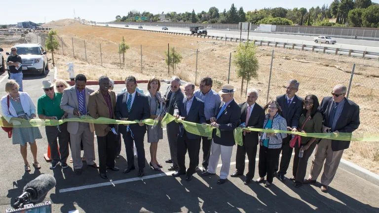 Dignitaries cut the ribbon