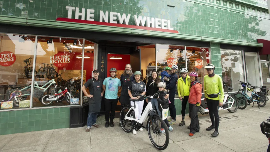 Oakland Mayor Sheng Thao at the New Wheel bike shop and Bike to Work Day Energizer Station.