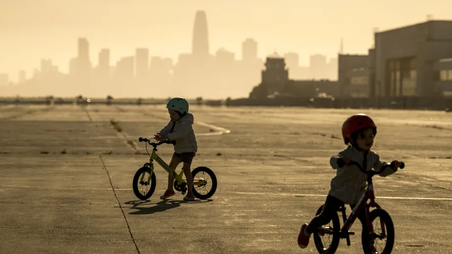 Silhouette of young bike riders on Bike to Wherever Days 2025.