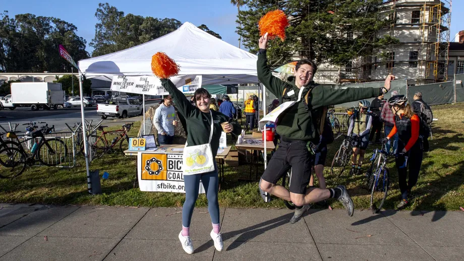 Enthusiastic volunteers at a Bike to Wherever Days 2025 energizer station.