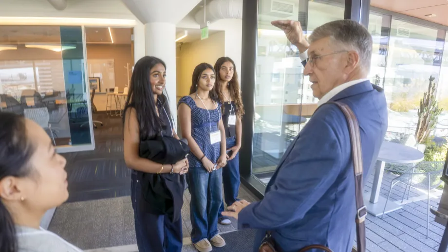 Students from the 2025 class of the Norman Mineta Summer Academy on a tour of the Bay Area Metro Center with former ABAG executive Bradford Paul.