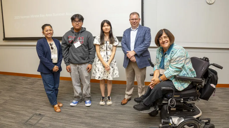 Commissioner Dorene Giacopini, Policy Advisory Council chair Carina V. Lieu and MTC chief operating officer Nick Roethel with capstone presentation winners from the 2025 class of the Norman Mineta Summer Academy.
