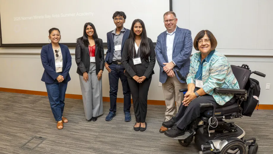 Commissioner Dorene Giacopini, Policy Advisory Council chair Carina V. Lieu and MTC chief operating officer Nick Roethel with capstone presentation winners from the 2025 class of the Norman Mineta Summer Academy.