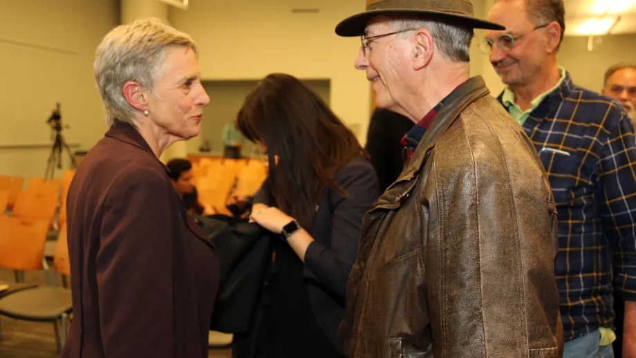 two people talking
