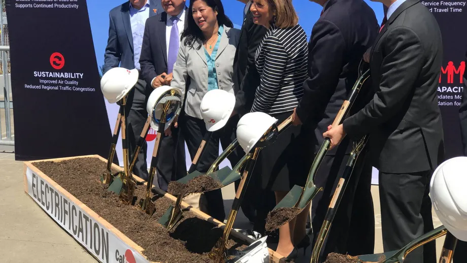 group of people with shovels