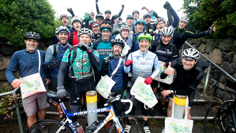 The Raiders, a group of daily bike commuters, celebrates BTWD at the Golden Gate Bridge Energizer Station