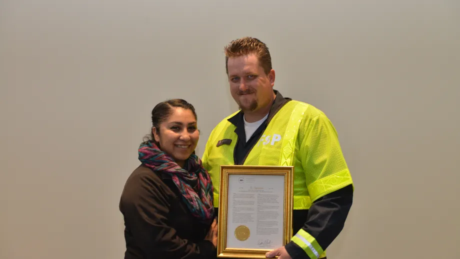 Freeway Service Patrol tow truck driver Darryl Poe with his wife