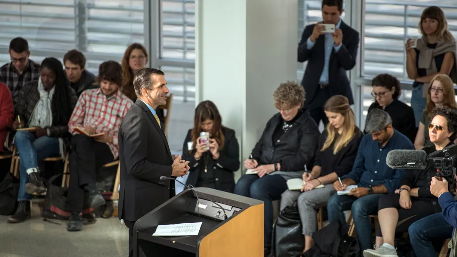 City of San Jose Mayor Sam Liccardo speaks to design team members under the city hall rotunda
