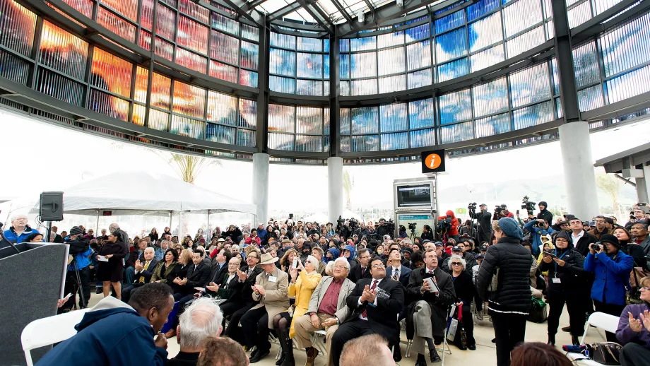 crowd sits inside at Warm Spring Station