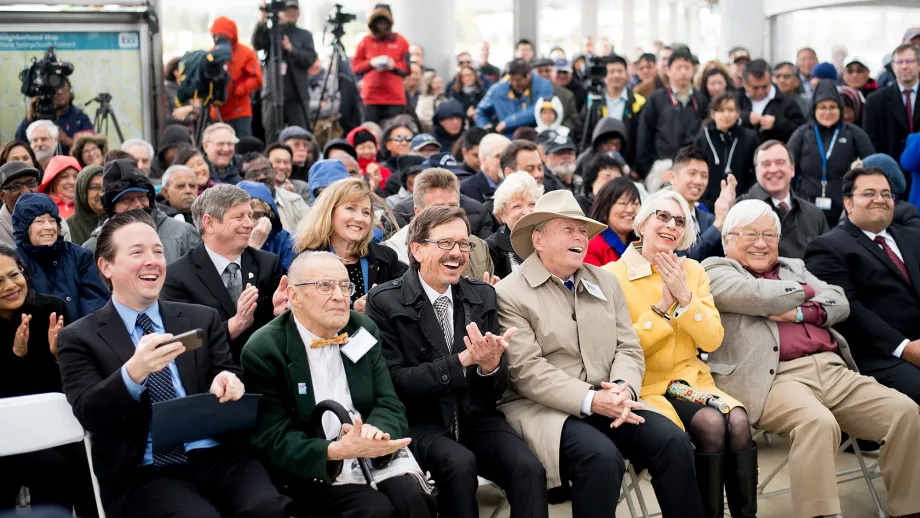 crowd sits inside at Warm Spring Station