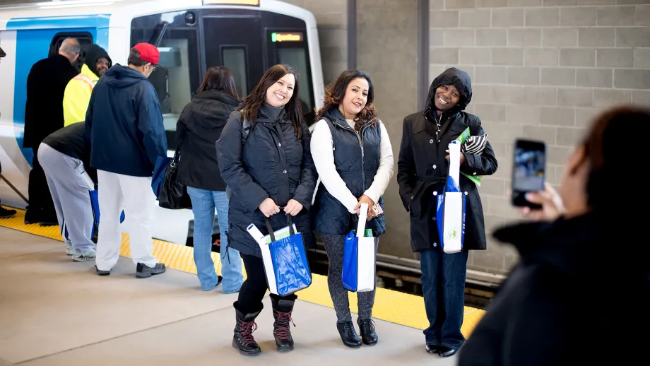 people on platform outside of train