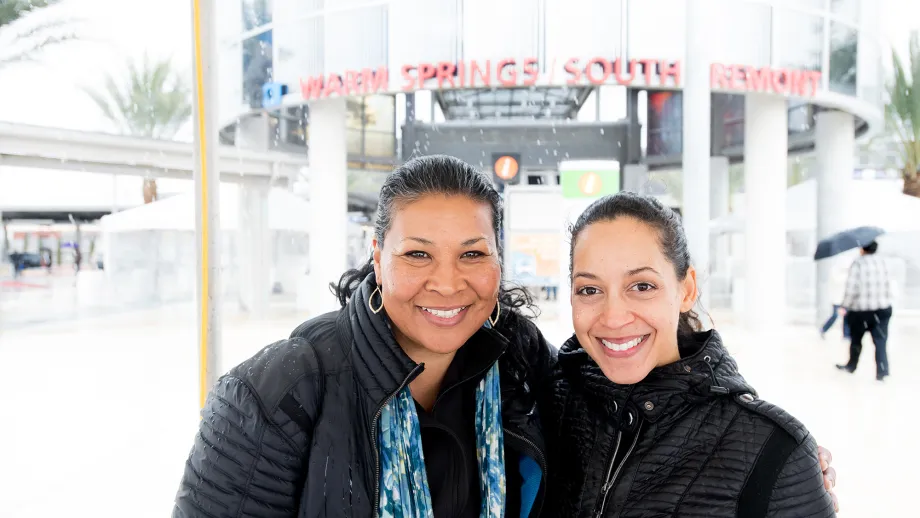 two woman outside warm spring station