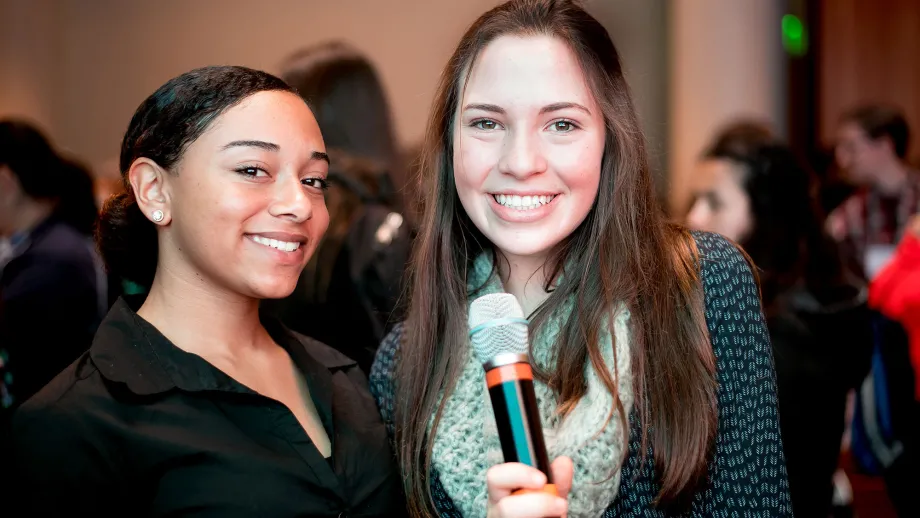 young woman with a microphone