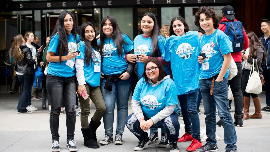 young adults posing for picture