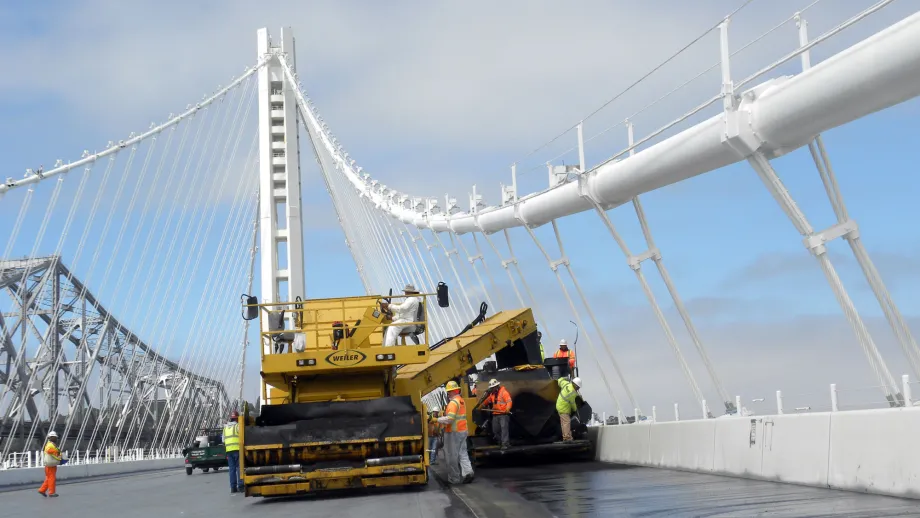 Paving the Self-Anchored Suspension Span