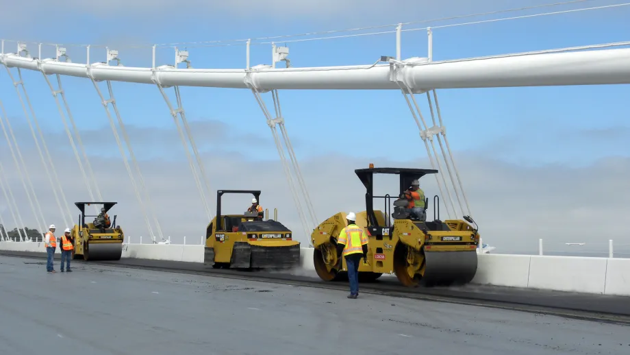 Paving the Self-Anchored Suspension Span