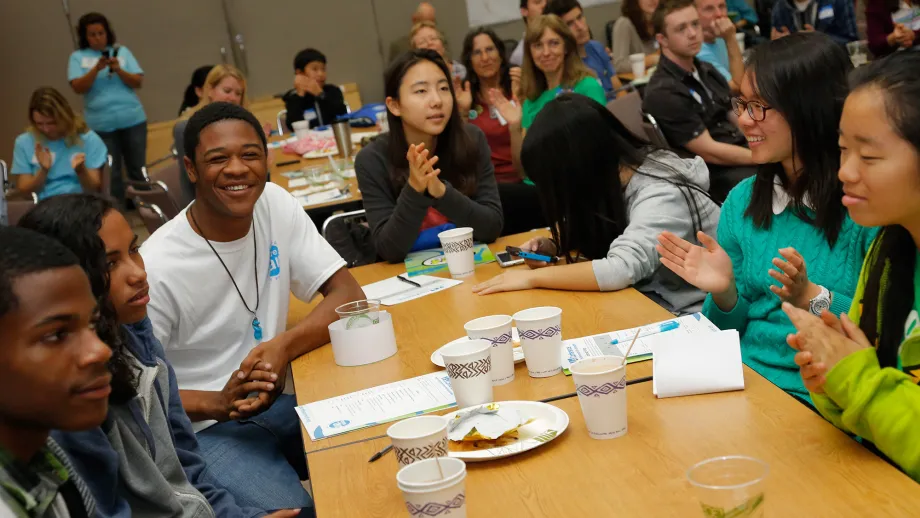 YES participants chat about the environment over breakfast.