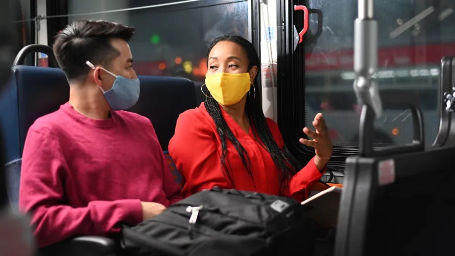 Masked riders on an AC Transit bus.