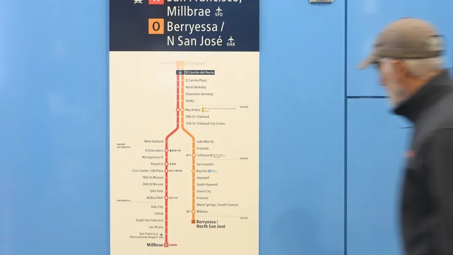 A man looks at a Line Diagram at El Cerrito del Norte BART station.