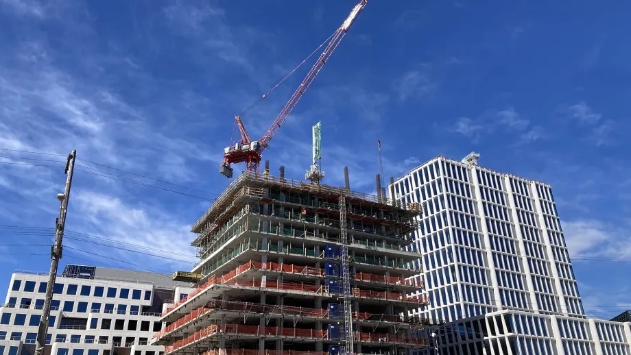 Housing construction site against a beautiful blue sky.