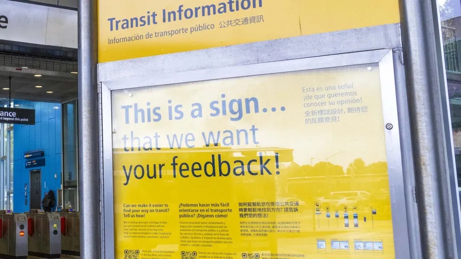 Sign at the El Cerrito del Norte station encouraging public feedback on the mapping and wayfinding project test signs.