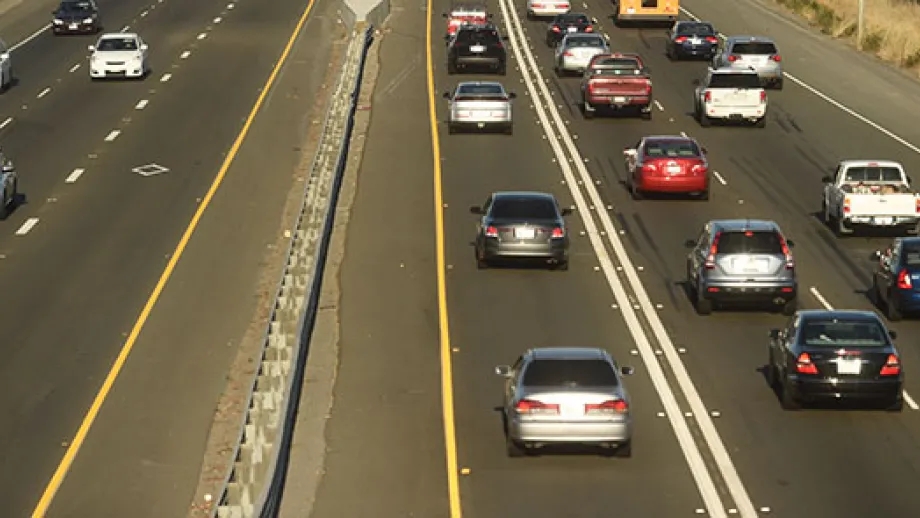 Aerial view of a highway with Express Lanes and rush hour traffic